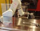 innomec progettazione cella robotica pizzacroccante milano particolare vista end effector robots